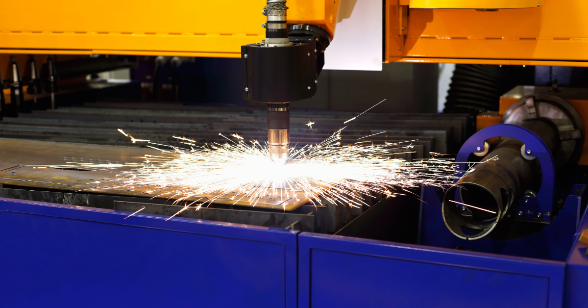 a cnc plasma cutting table in actions with sparks flying